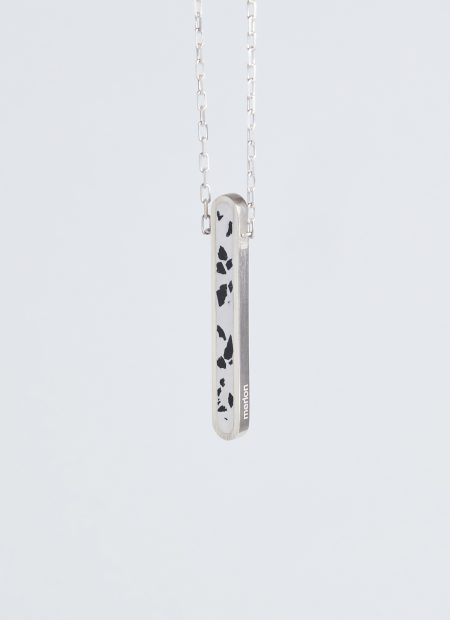 Arcil necklace – handcrafted concrete and silver minimalist architectural jewelry.