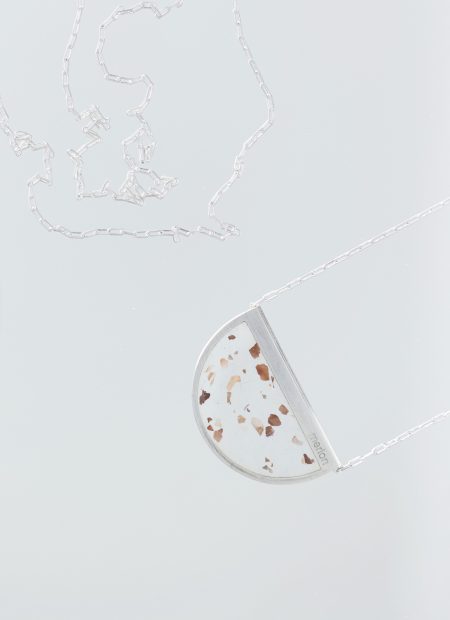 Exedra necklace – handcrafted concrete and silver minimalist architectural jewelry.