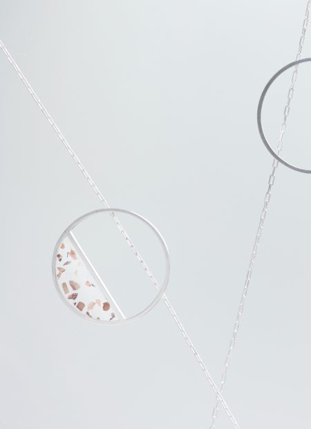 Hurne necklace – handcrafted concrete and silver minimalist architectural jewelry.