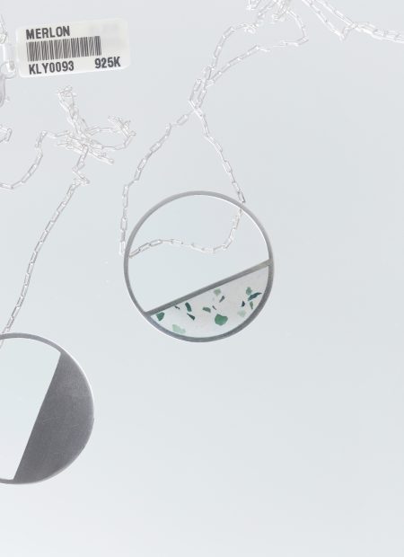 Hurne necklace – handcrafted concrete and silver minimalist architectural jewelry.