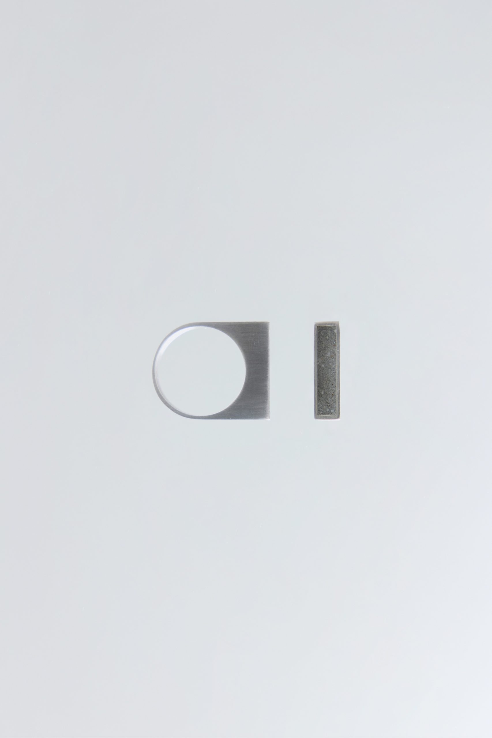 Latern ring – handcrafted concrete and silver minimalist architectural jewelry.