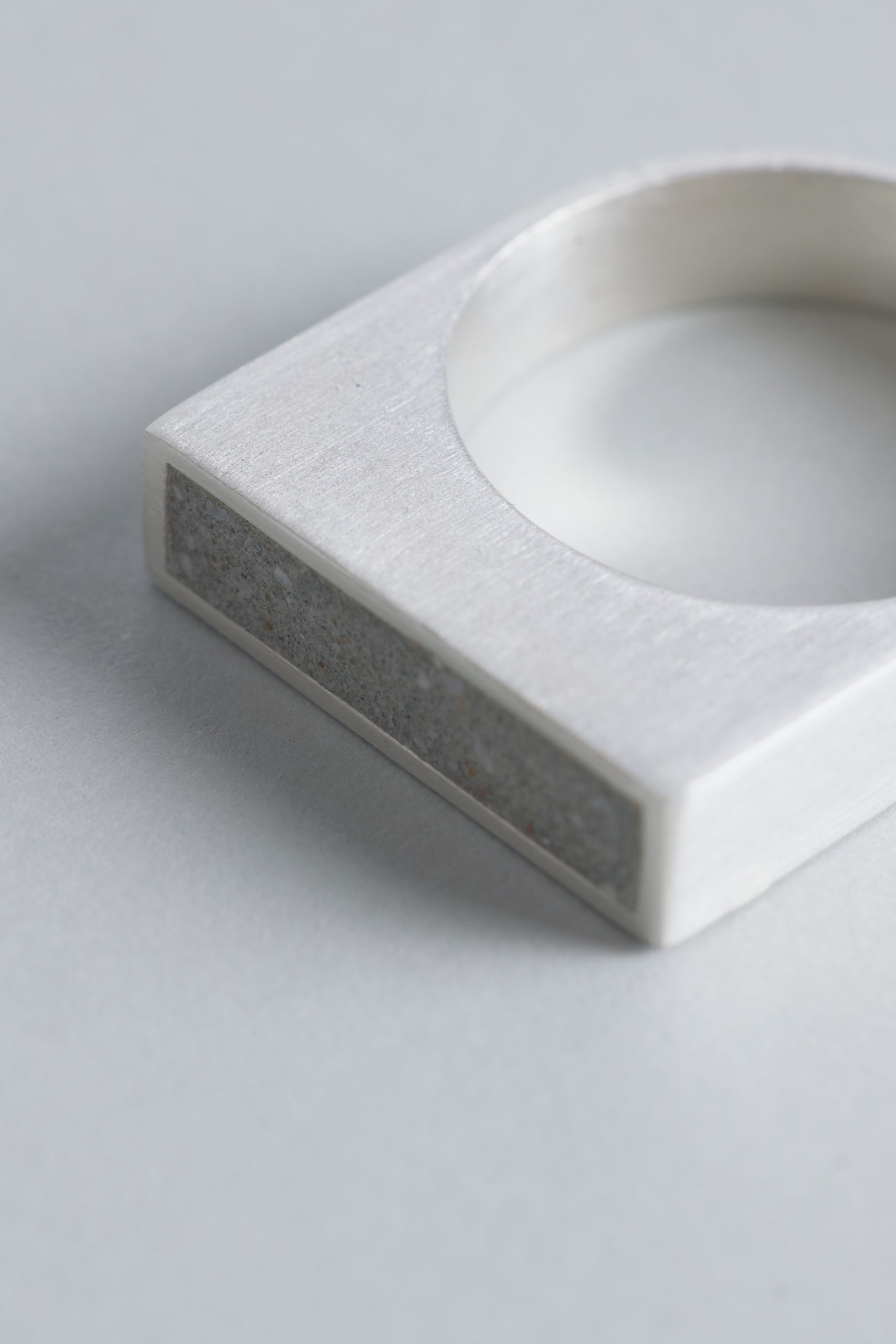 Latern ring – handcrafted concrete and silver minimalist architectural jewelry.