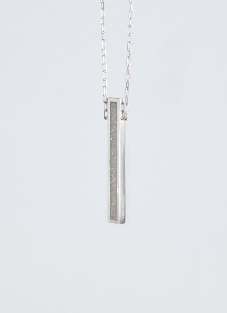 Lintour necklace – handcrafted concrete and silver minimalist architectural jewelry.