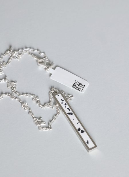 Lintour necklace – handcrafted concrete and silver minimalist architectural jewelry.