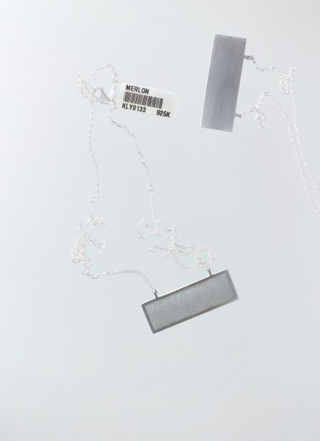 Panvell necklace – handcrafted concrete and silver minimalist architectural jewelry.